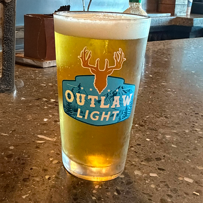 Outlaw Light Pint Glass